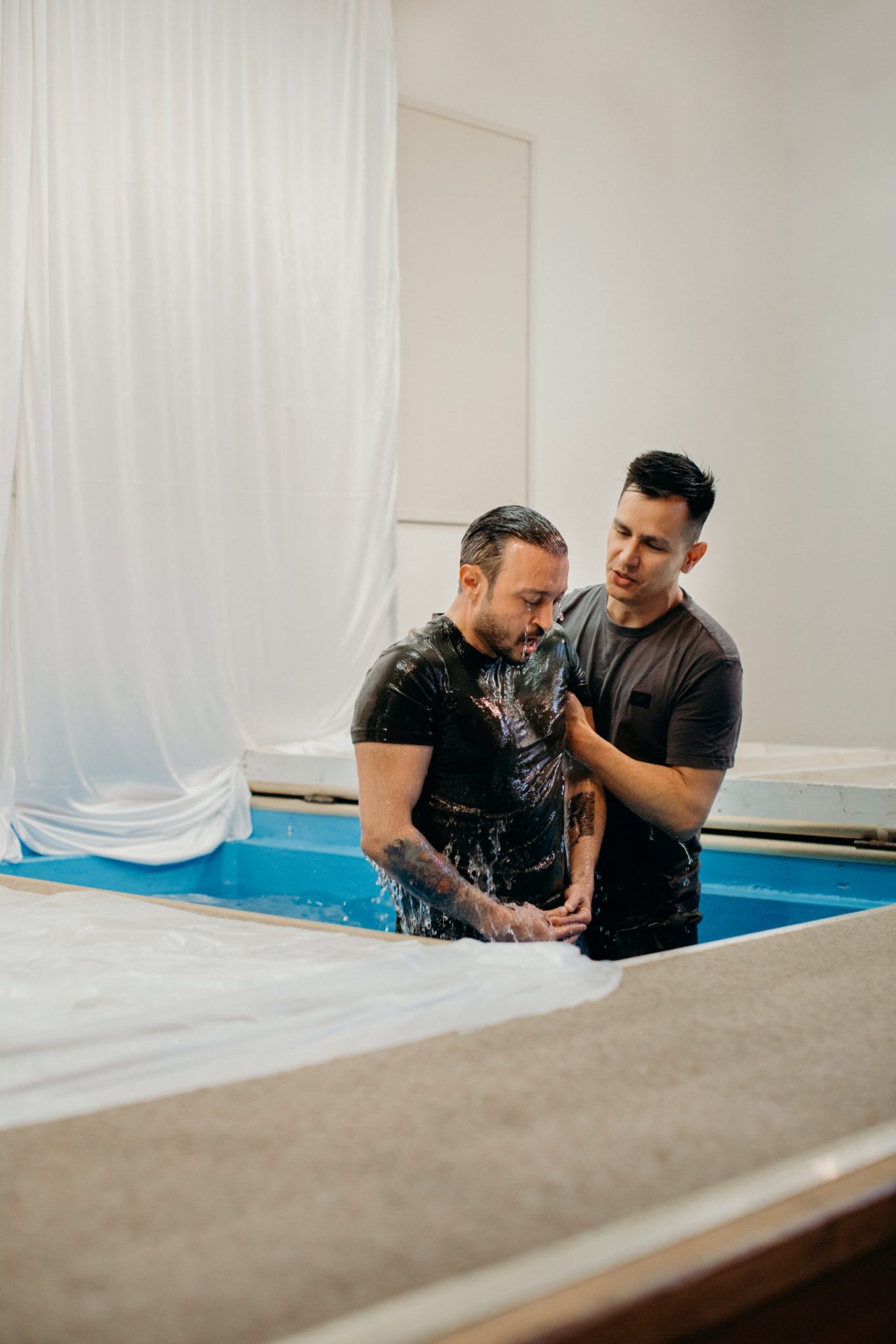 Man getting baptized at Cascades Church